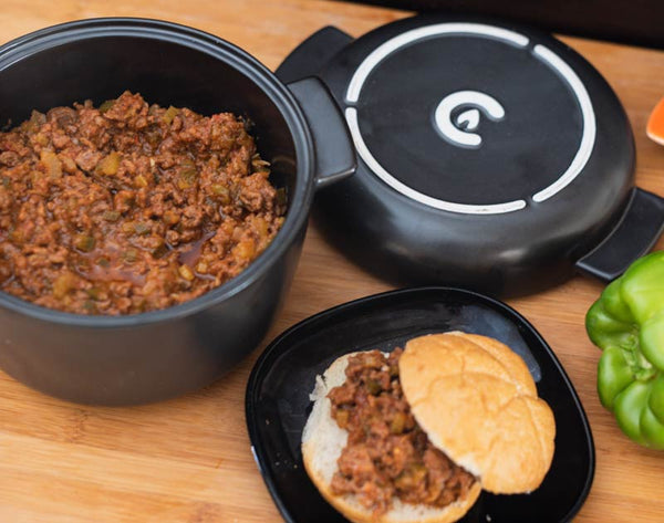 cooking food using Cru Ceramic Dutch Oven